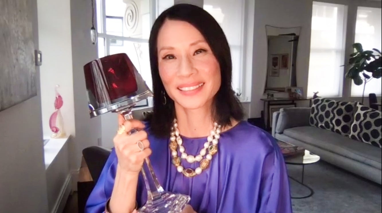 Lucy Liu holding Trophy