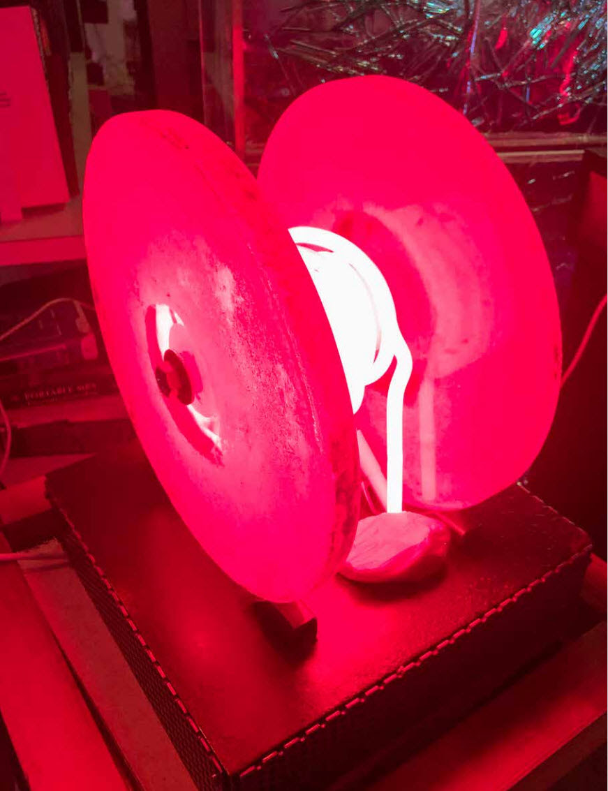 From left to right - Palimpsest (Made in Italy), Andrew Huston (2020). Cast glass. Fire, Federica Marangoni (2008-2012). Glass wheels and neon coil.