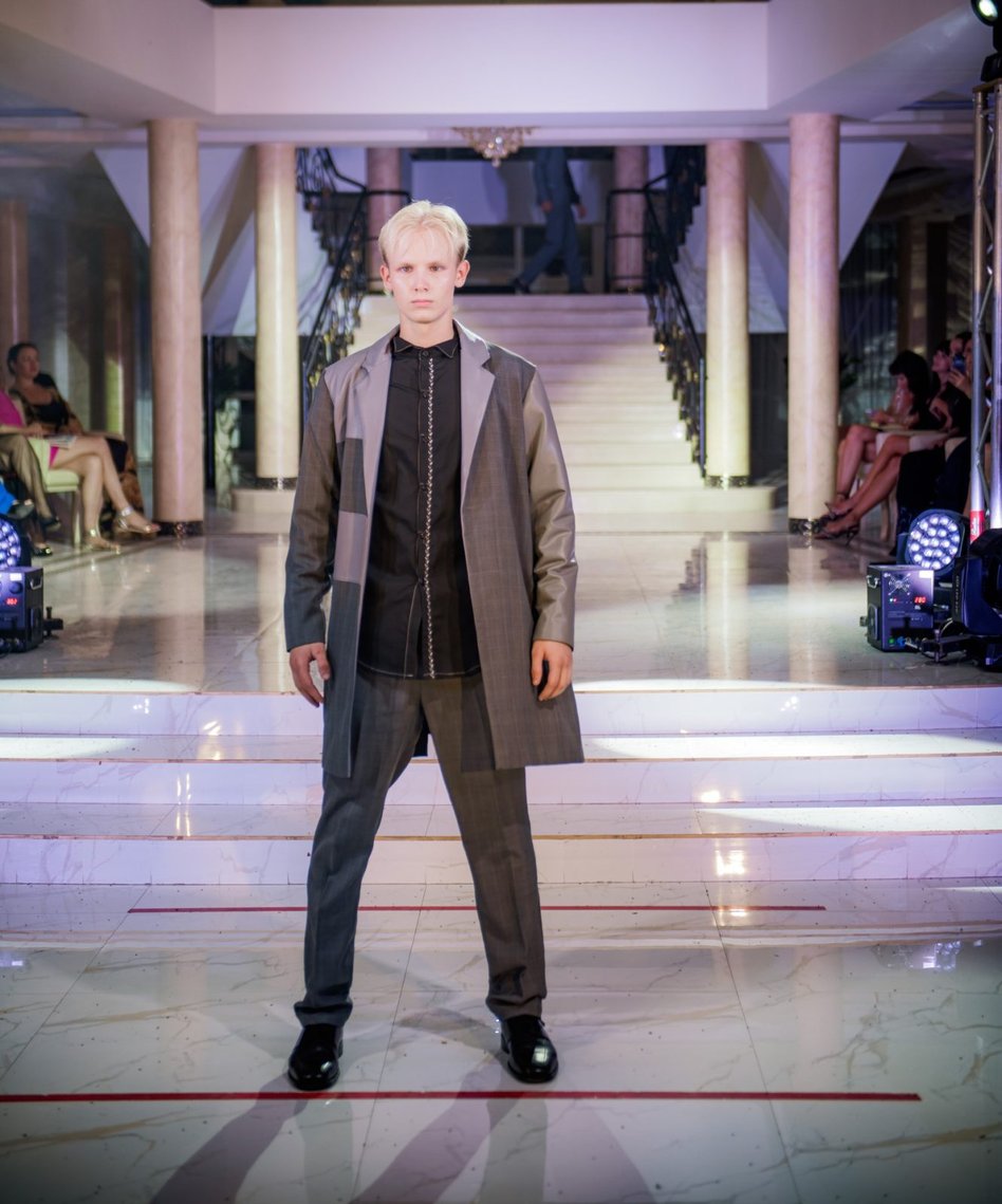 Designer Daniil Tkachenko with the Man Power men's collection