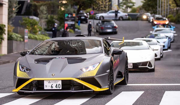 Ten Countach models on display and over 70 Lamborghinis parade through Tokyo