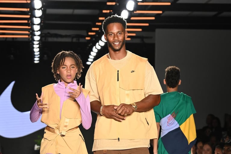 Victor Cruz and daughter Kennedy walk the runway for Nike during the 2022 Rookie USA Fashion Show at 608 Fifth Avenue on September 08, 2022 in New York City. @ NYFW Rookie USA