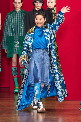 Hui greeting her audience