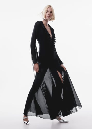 Flared dress with ruffled sleeves