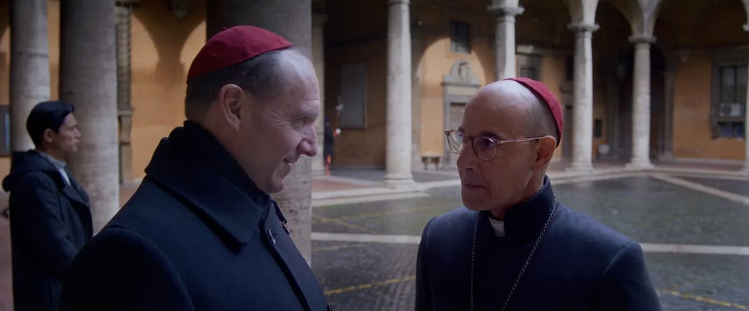 Ralph Fiennes and Stanley Tucci in Conclave. Courtesy of Focus Features