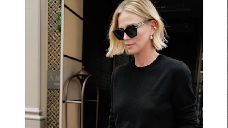 Charlize Theron Stuns in McQueen at New York