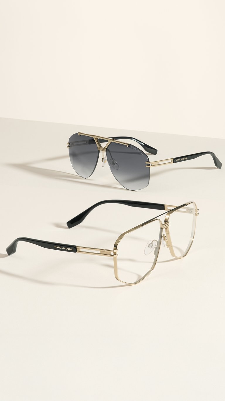 Marc Jacobs Fall-Winter 2025 Eyewear Campaign Featuring Emily Ratajkowski Marc Jacobs introduces its Fall/Winter 2025 Eyewear Campaign featuring American model, actor, and activist Emily Ratajkowski, alongside actor and singer Jeremy Pope. The campaign is captured in a series of refined portraits, with their pets Colombo and Maui adding a playful touch to the sophisticated visuals. The collection showcases bold sunglasses and optical frames crafted from premium materials, defined by edgy silhouettes and distinctive branding. Women’s styles feature THE SUNGLASSES and THE GLASSES logos, with designs ranging from oversized to minimalist frames, all in a refined color palette and adorned with the iconic J MARC signature. Men’s styles emphasize modernity and lightness, with rimless titanium frames and clean architectural lines for a sleek, contemporary look. Key Styles Include: MARC 858/G/S: Elongated oval acetate sunglasses with THE SUNGLASSES logo; available in black or pink polka dot with grey lenses. MARC 862: Geometric acetate optical frames with THE GLASSES logo; available in black, Havana, and transparent brown. MARC 851/S: Bold cat-eye sunglasses in bi-layer acetate with J MARC metal trim and MARC JACOBS logo; available in black, black/havana, and burgundy/hot pink. MARC 855: Square optical frames in bi-layer acetate with J MARC detailing; available in black/havana, black/ivory, and Havana. MARC 873/S: Oversized rimless titanium sunglasses with double metal trim and MARC JACOBS logo; available in black, matte black, and transparent blue/marble blue. MARC 874: Geometric titanium optical frames with double bridge and MARC JACOBS logo; available in gold with matte black, Havana, or burgundy temples. Emily Ratajkowski wears the MARC 851/S sunglasses, while Jeremy Pope is seen in the MARC 873/S. Colombo and Maui also make stylish appearances in MARC 873/S and MARC 874 frames, respectively. The Fall/Winter 2025 Eyewear Collection will be available in Marc Jacobs boutiques and select eyewear retailers worldwide starting October 2025. The collection is produced and distributed by Safilo Group, a global leader in eyewear manufacturing for over 90 years.