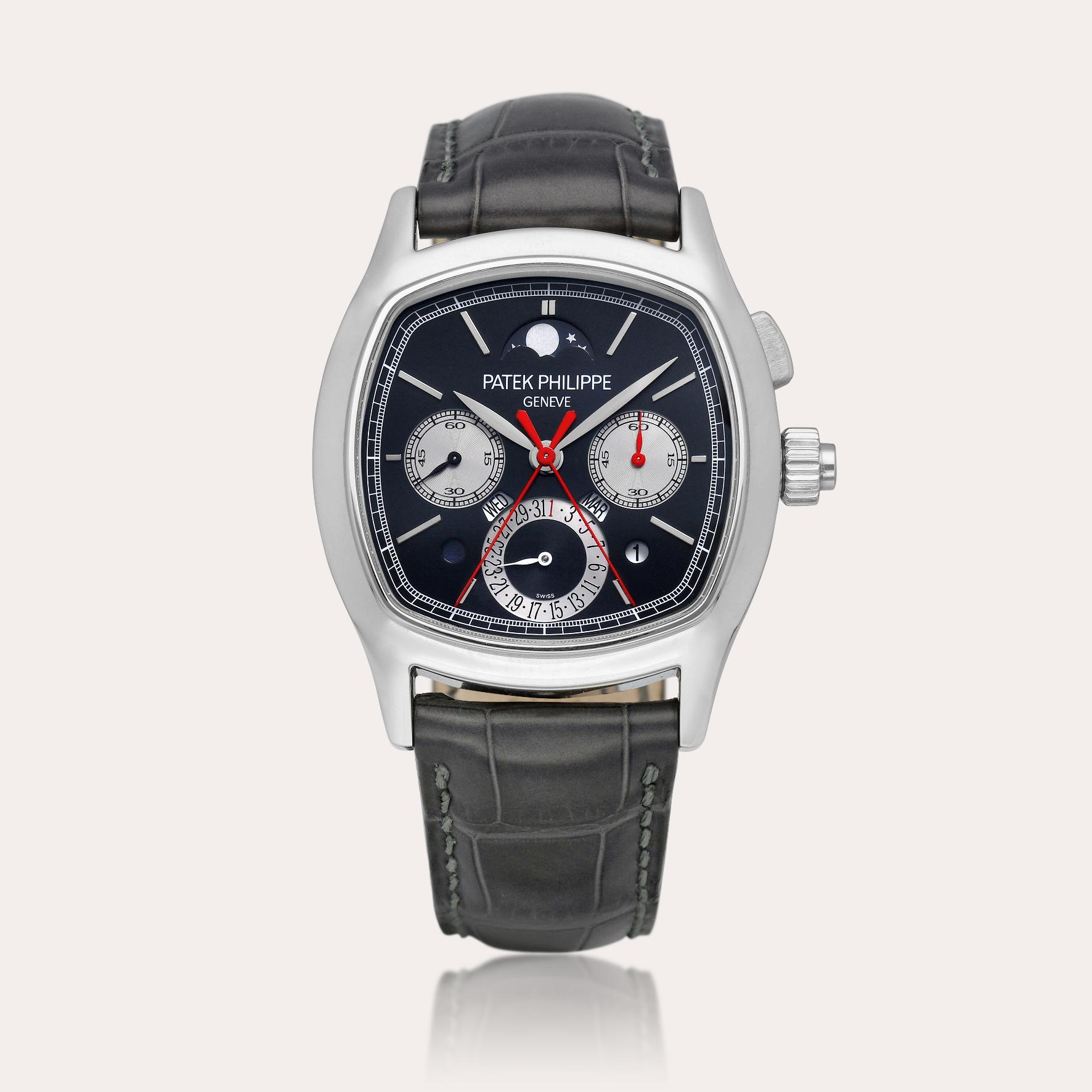 Patek Philippe, A platinum perpetual calendar split seconds chronograph wristwatch with moon phases, leap year and day and night indication, estimate $250,000-350,000