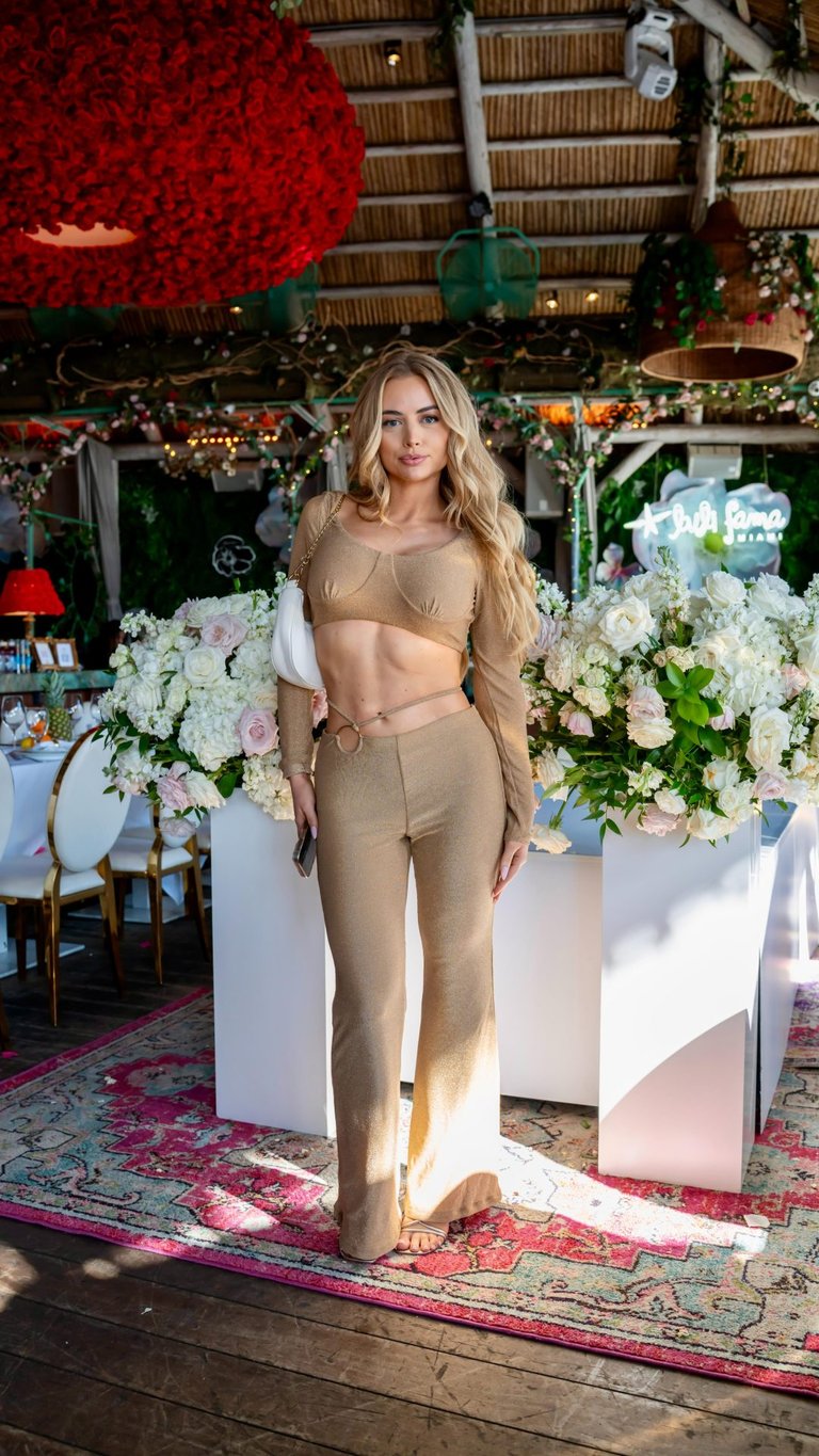 Mackenzie Dipman wearing Luli Fama at Luli Basel during Art Basel Miami at Kiki On The River
