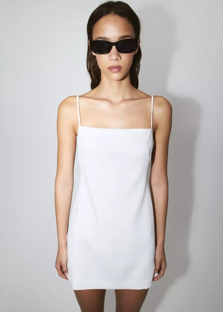 Short dress with side openings