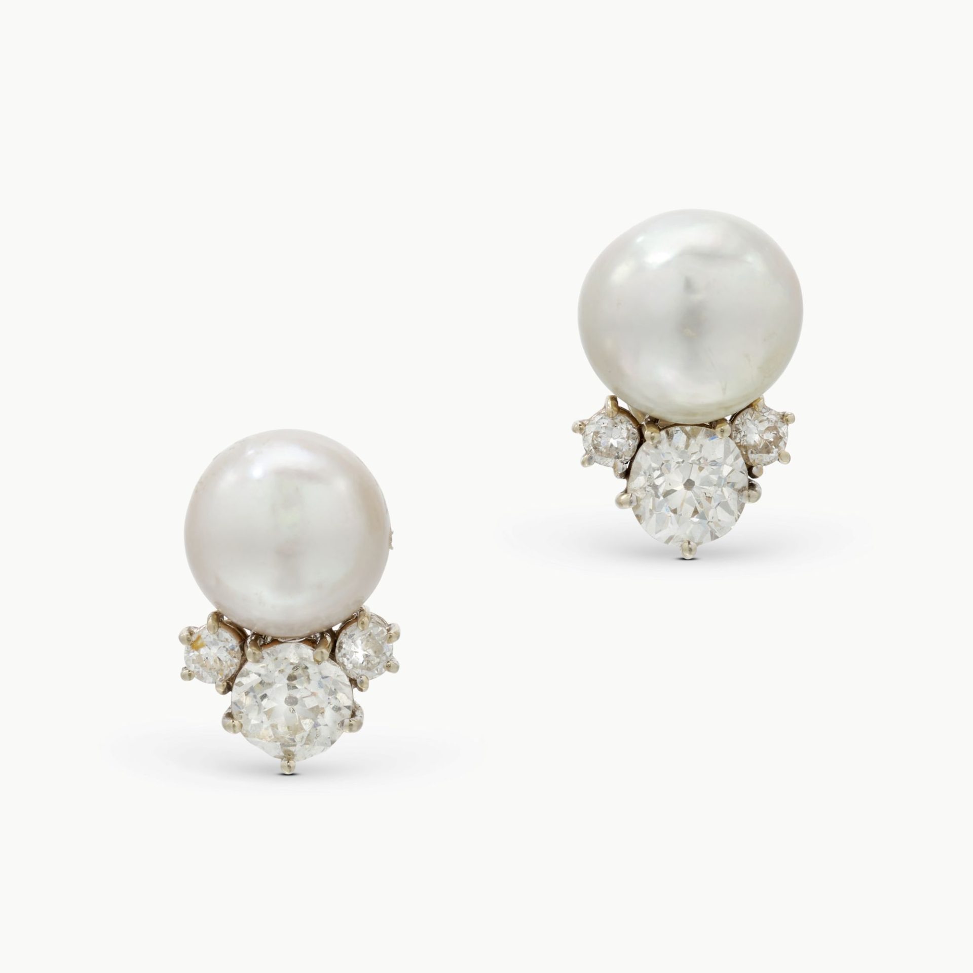 Lot 600. Faraone, Pair of Natural Pearl and Diamond Earrings, est. 18,000 - 28,000 CHF