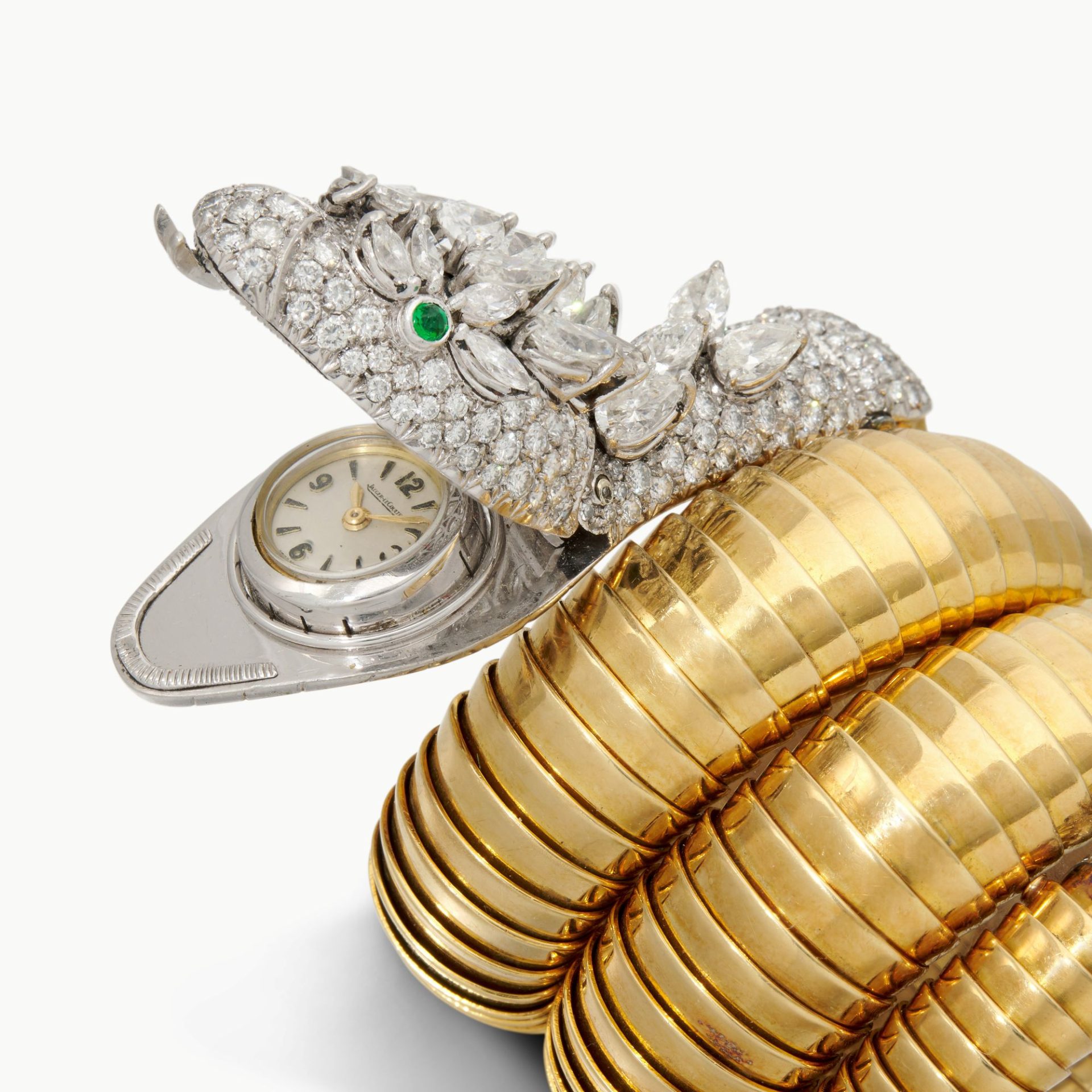 Lot 602. Bulgari, Gold, Emerald and Diamond 'Serpenti' Wristwatch, est. 180,000 - 380,000 CHF (2)